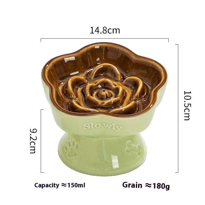 Ceramic anti-tumble pet bowl for dogs and cats with high foot and neck protector.