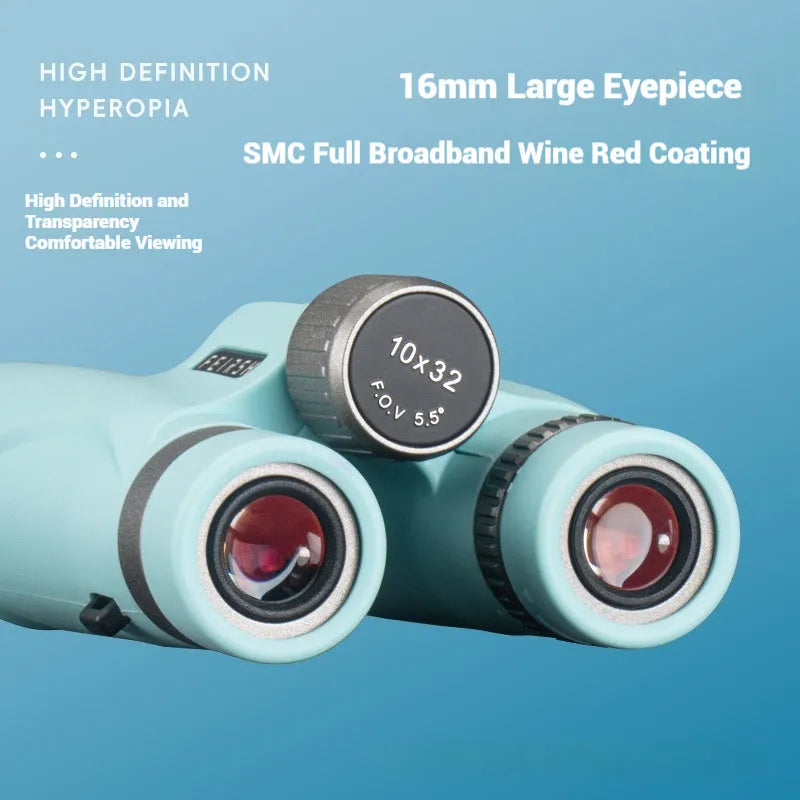 Close-up of grey 10x32 compact binoculars with wine red film lenses on a textured background.