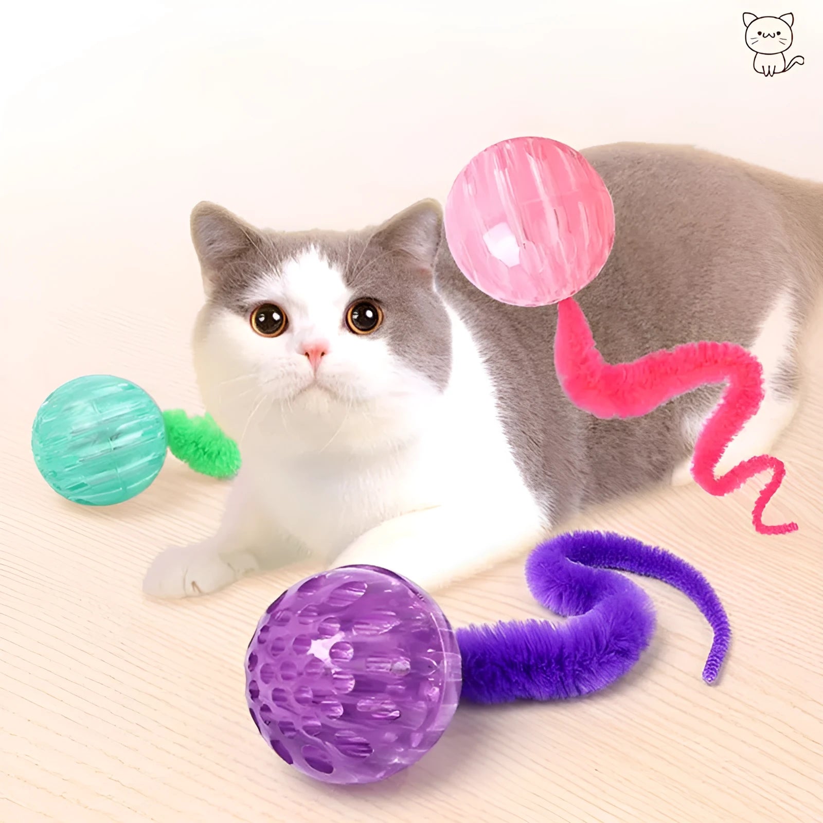 Interactive cat ball toy with worm tail in green on light background