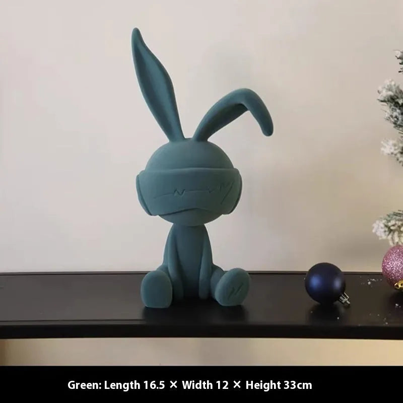 Resin suede blindfold rabbit table ornament in blue, green, and red colour options
