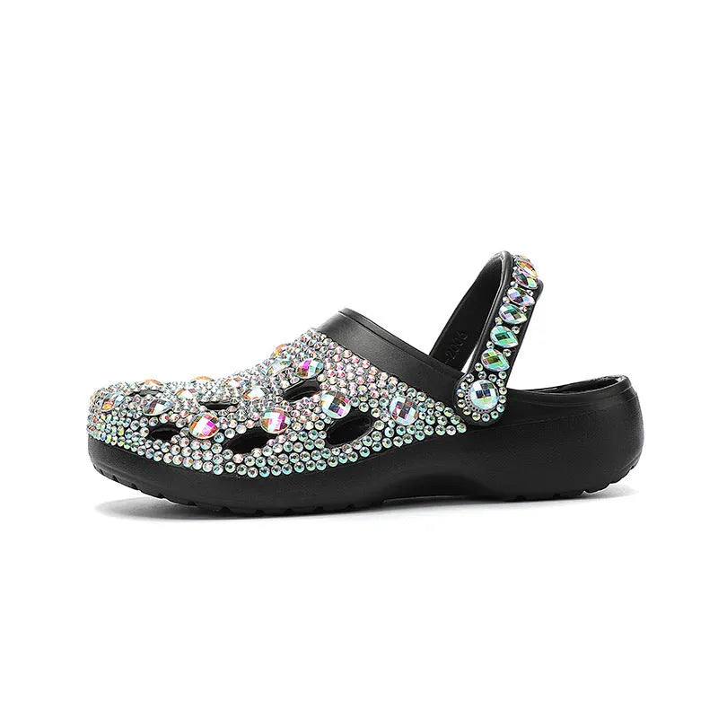 Black women's platform casual sandals with rhinestone detail on an EVA upper and sole.