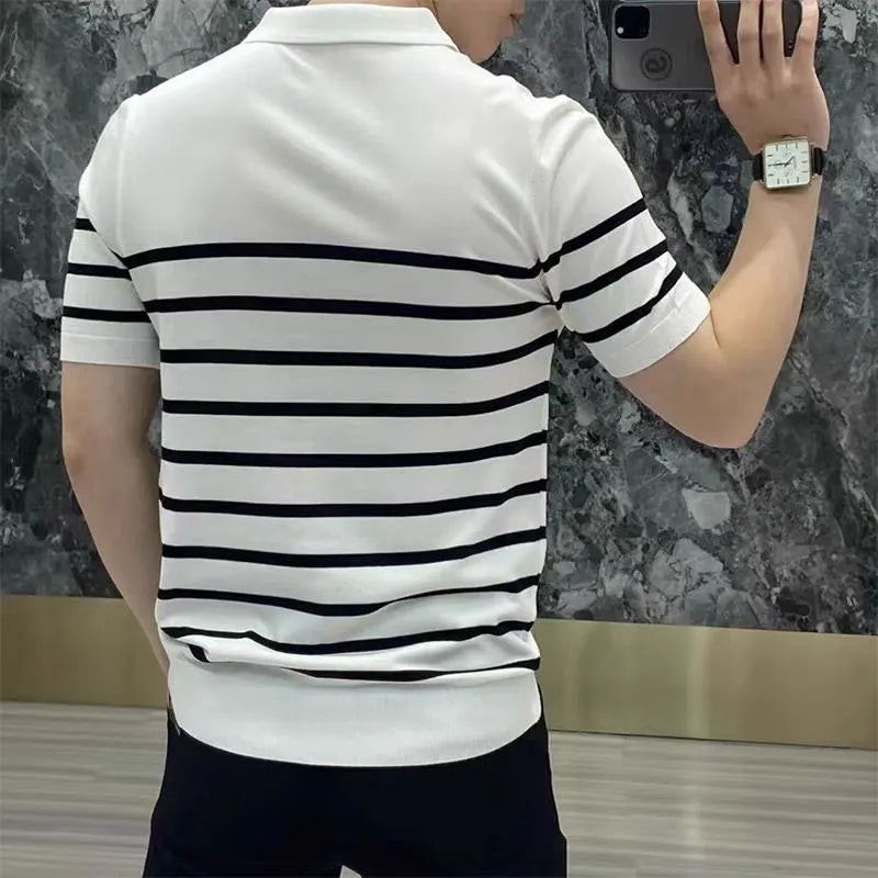 Black and white striped pullover T-shirt laid flat, showing non-iron casual design.