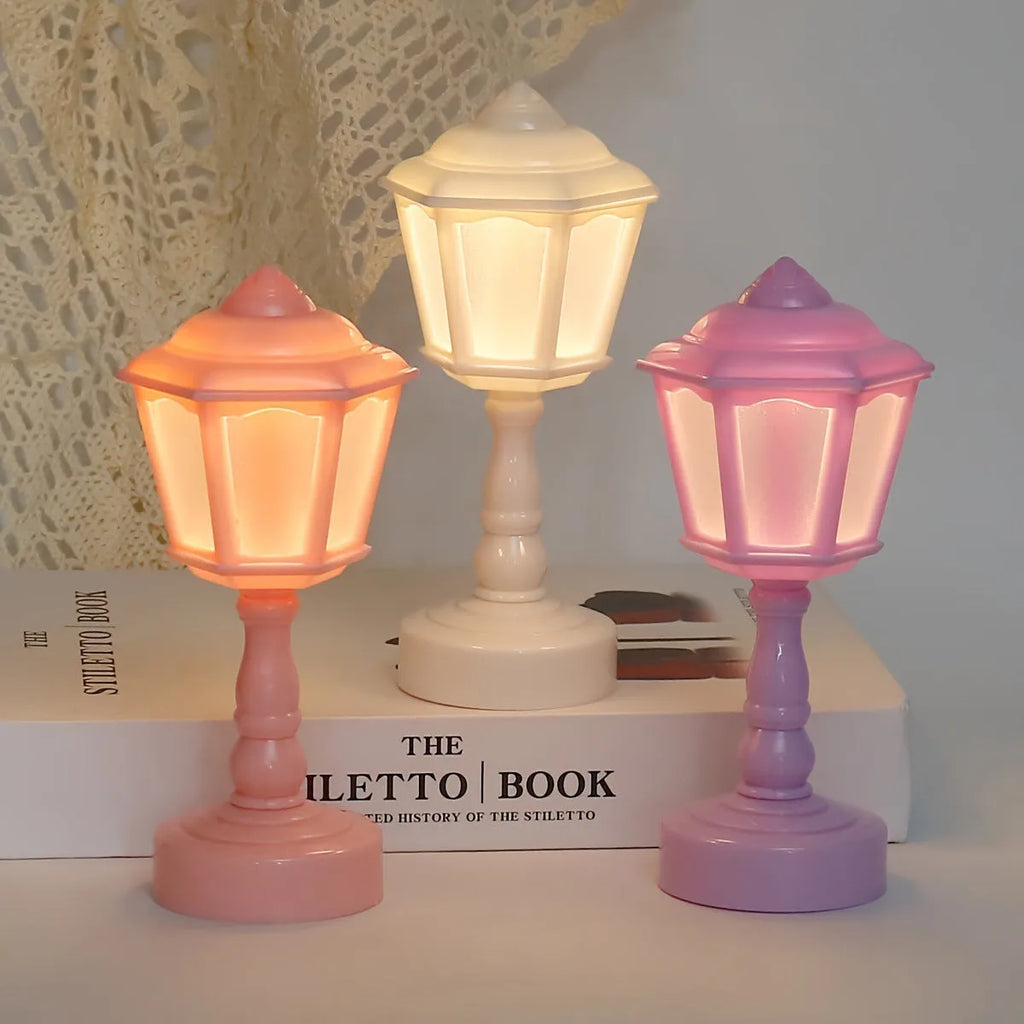 Retro pagoda-shaped small LED night lamp in light purple with geometric stereo design
