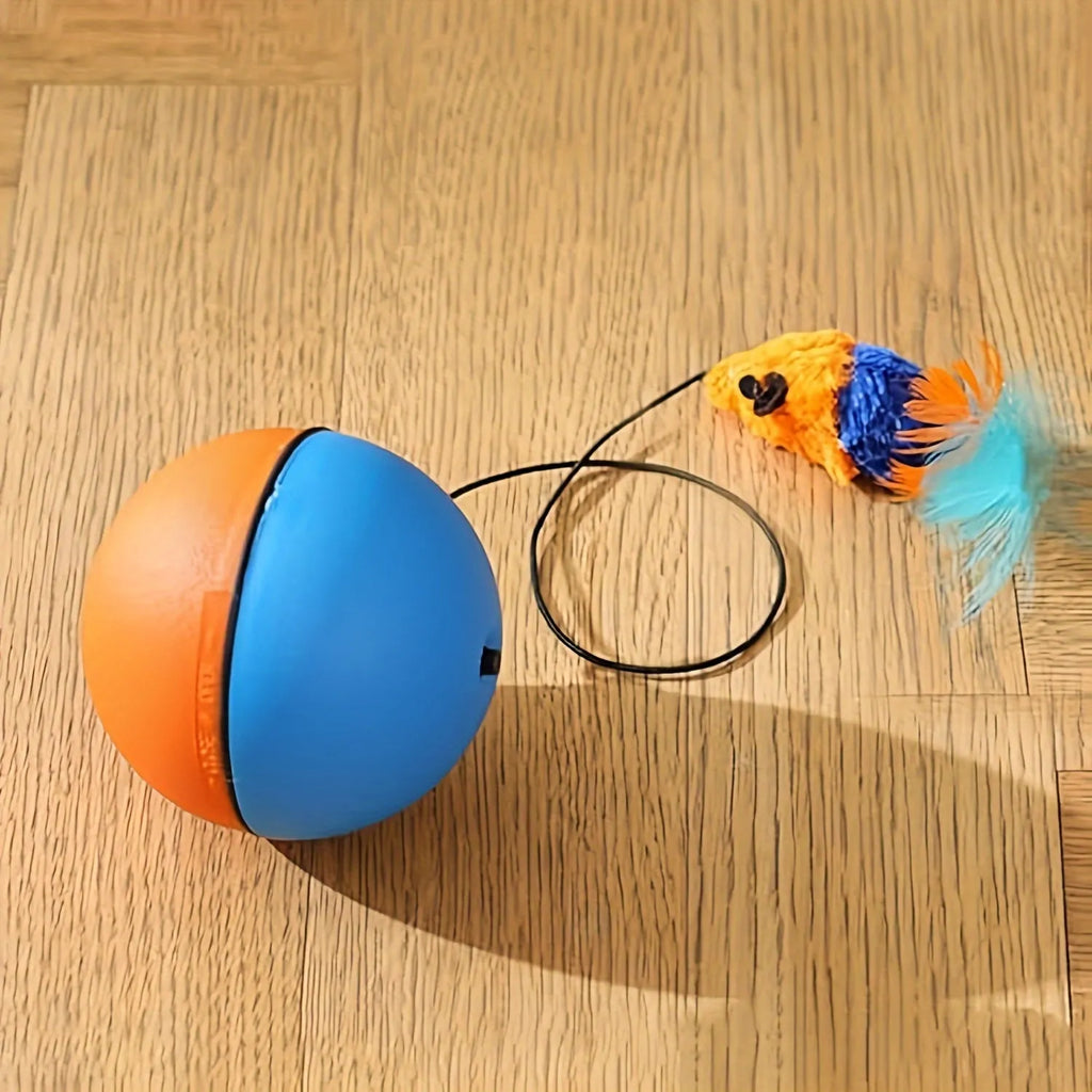 Interactive cat toy ball with blue and orange plush mouse and rolling base on floor