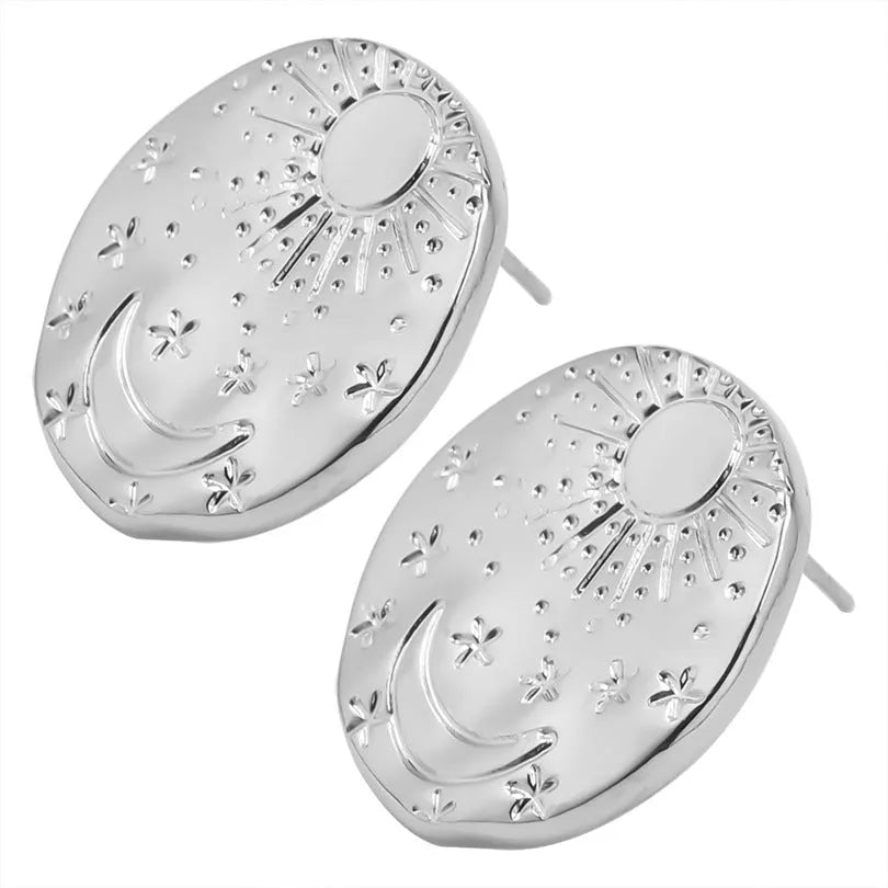 A pair of geometric shell design stud earrings in stainless steel with gold or silver plating