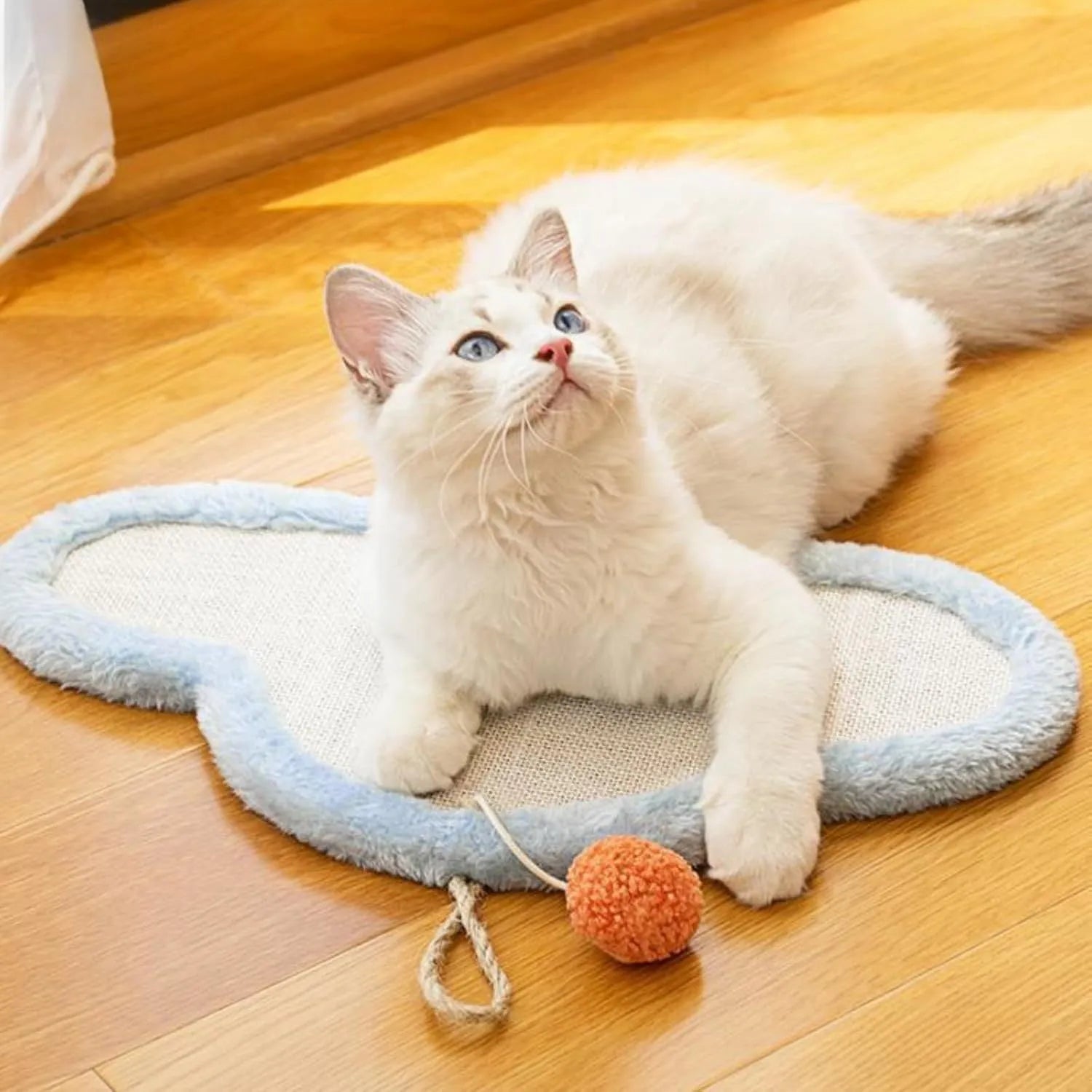 White cat scratching mat with sleeping cat cartoon pattern, natural sisal surface, wall mounted design
