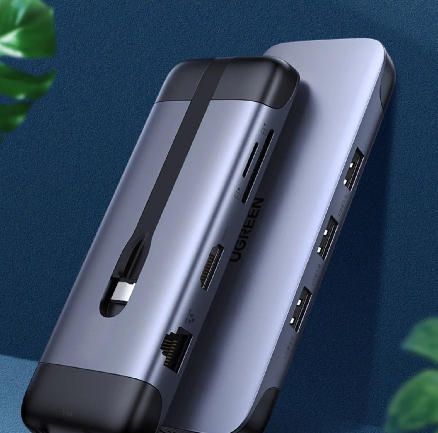 USB-C dock expansion adapter showing HDMI, USB 3.0, and charging ports with included connecting cables