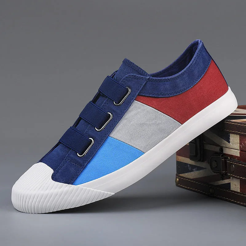 Men's low-top canvas sneakers in beige with elastic band closure and vulcanised rubber sole.