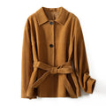 Women's loose-fit caramel mocha cashmere coat with a Peter Pan collar belt and leather stitching.