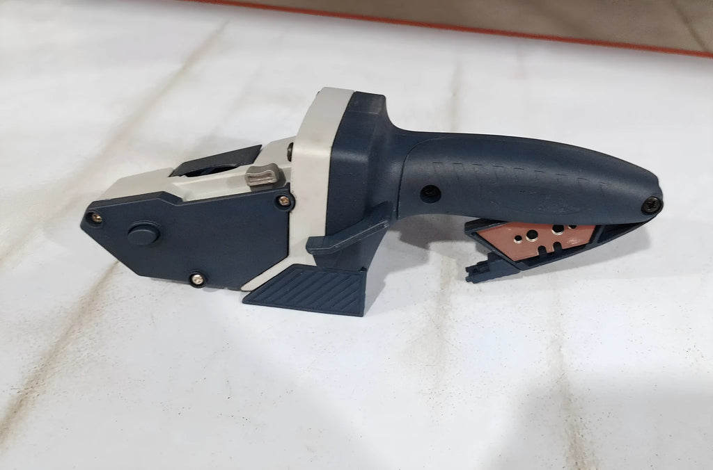 Blue aluminium alloy multifunctional woodworking cutter tool with one-press lock and measurement scale.