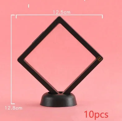 Transparent 3D floating display case holding a coin, with black and white size options