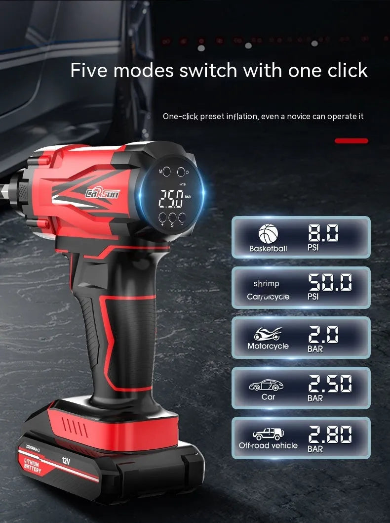 Red and black portable wireless car tyre air pump with power cable and nozzle attachments on a table.