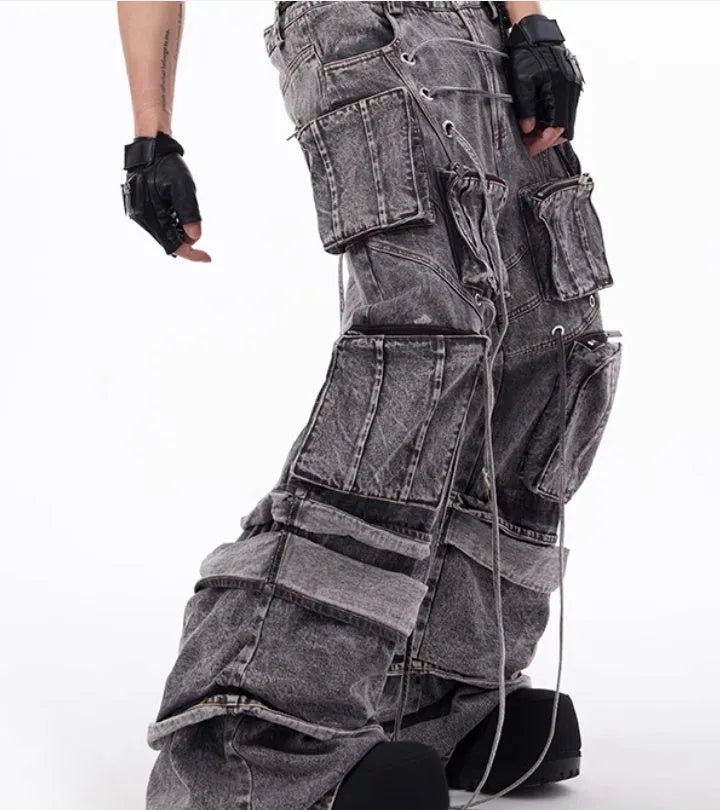 Grey distressed denim mop pants with rope stitching, American-style overalls, front view