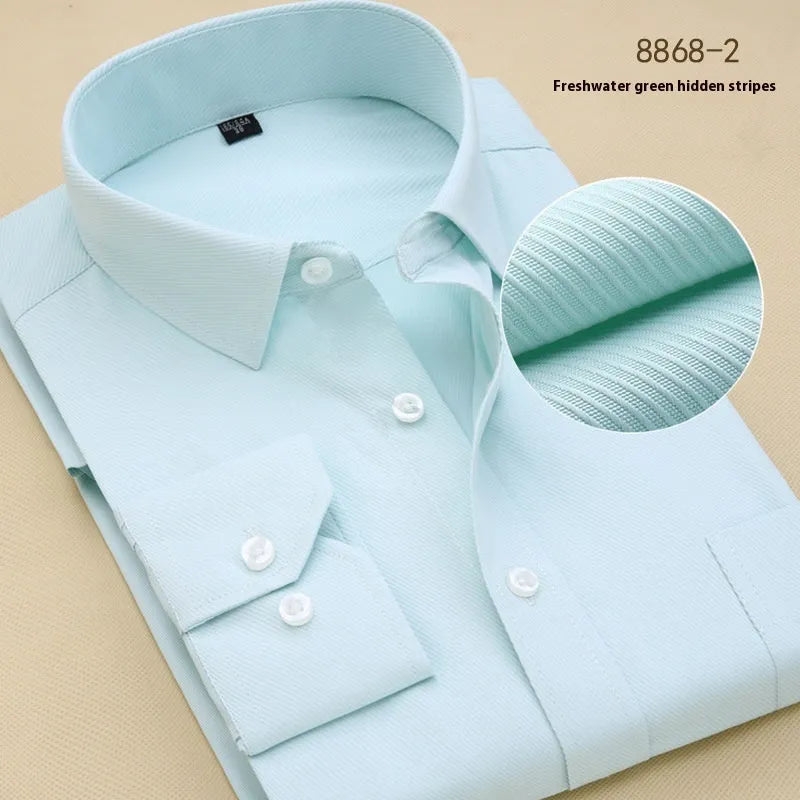 Men's black slim fit long sleeve business shirt made from cotton fabric on a hanger.
