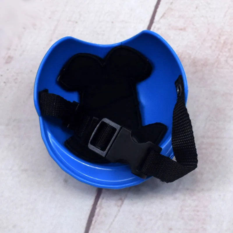 Solid colour plastic motorcycle cap helmet for dogs in pink, shown in small size.