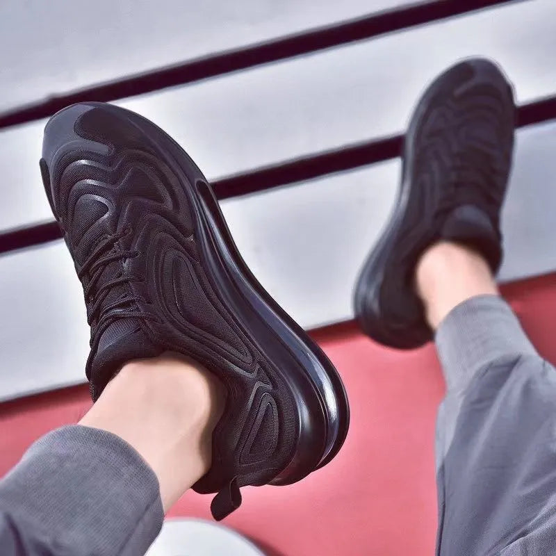 Men's black casual air cushion sneakers with thick sole and lace-up front.