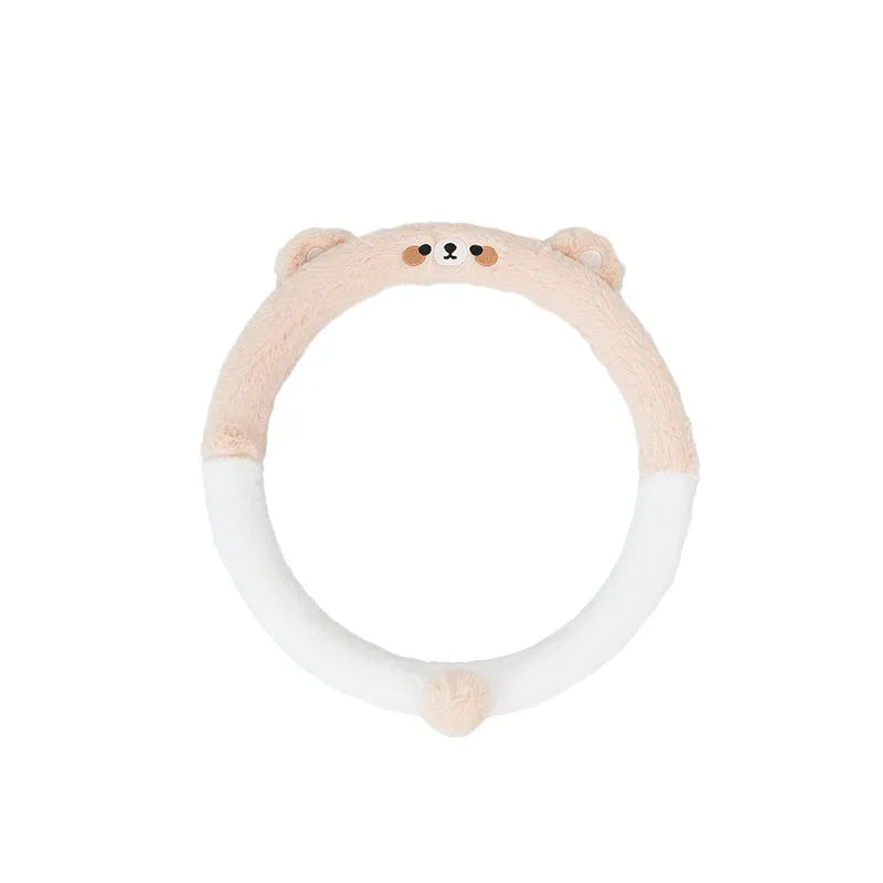 Plush winter car steering wheel cover with embroidered bear motif, designed for 38cm diameter wheels.