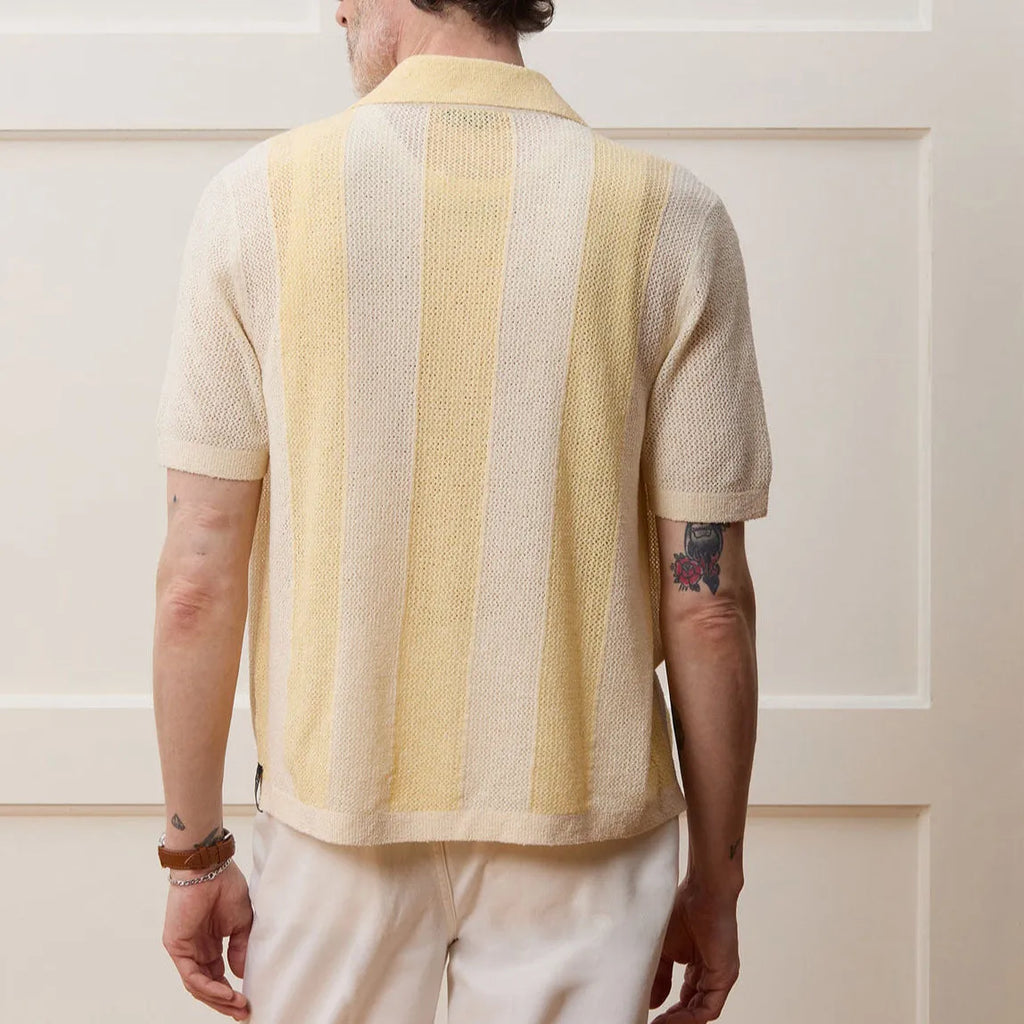Hollow-out short-sleeved Tencel polo shirt in yellow with asymmetric design