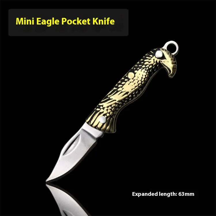 Brass mini folding knife with 3cm blade and keychain pendant on brass ring, 50mm full length model shown