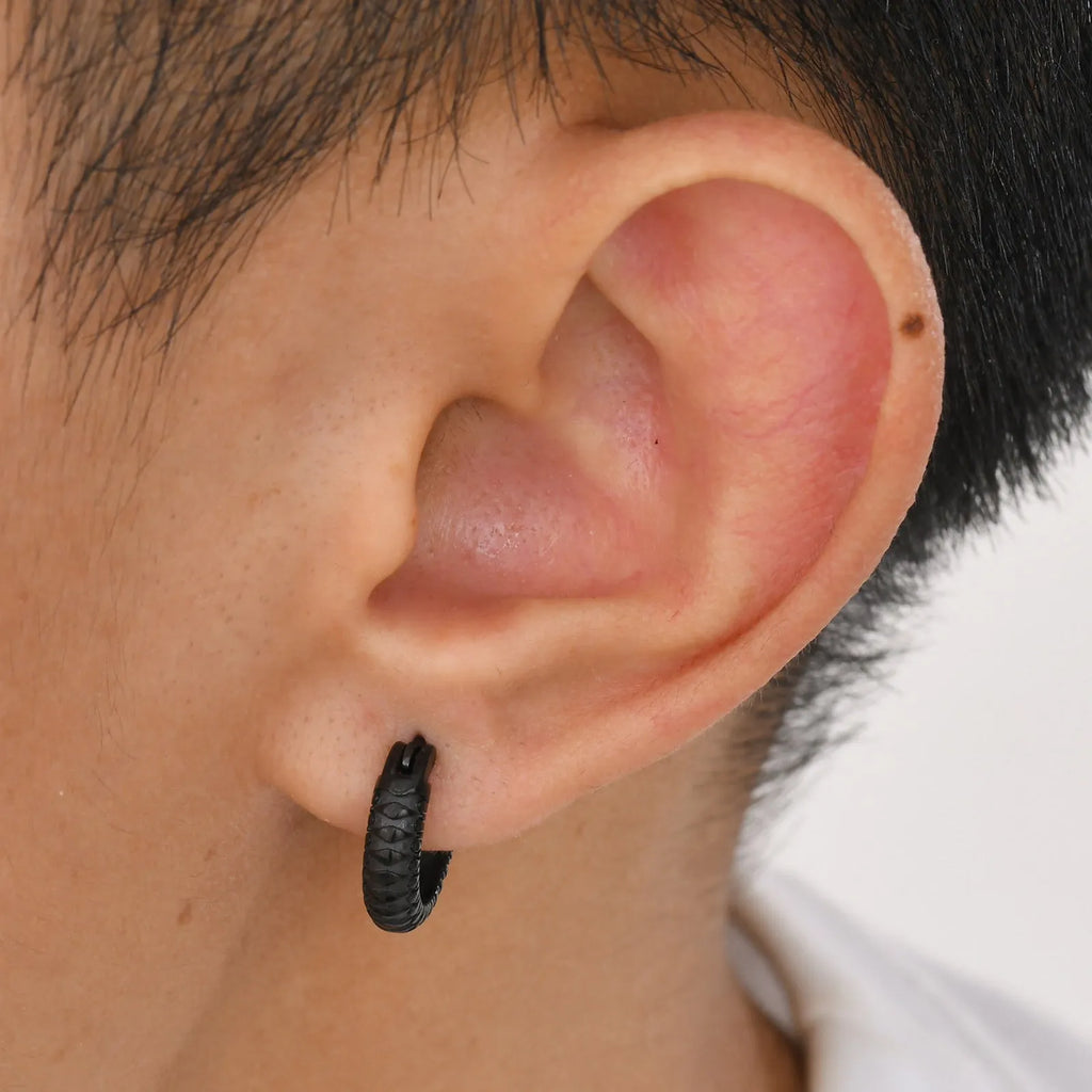 Stainless steel snake pattern drop hoop earrings in black and gold colours