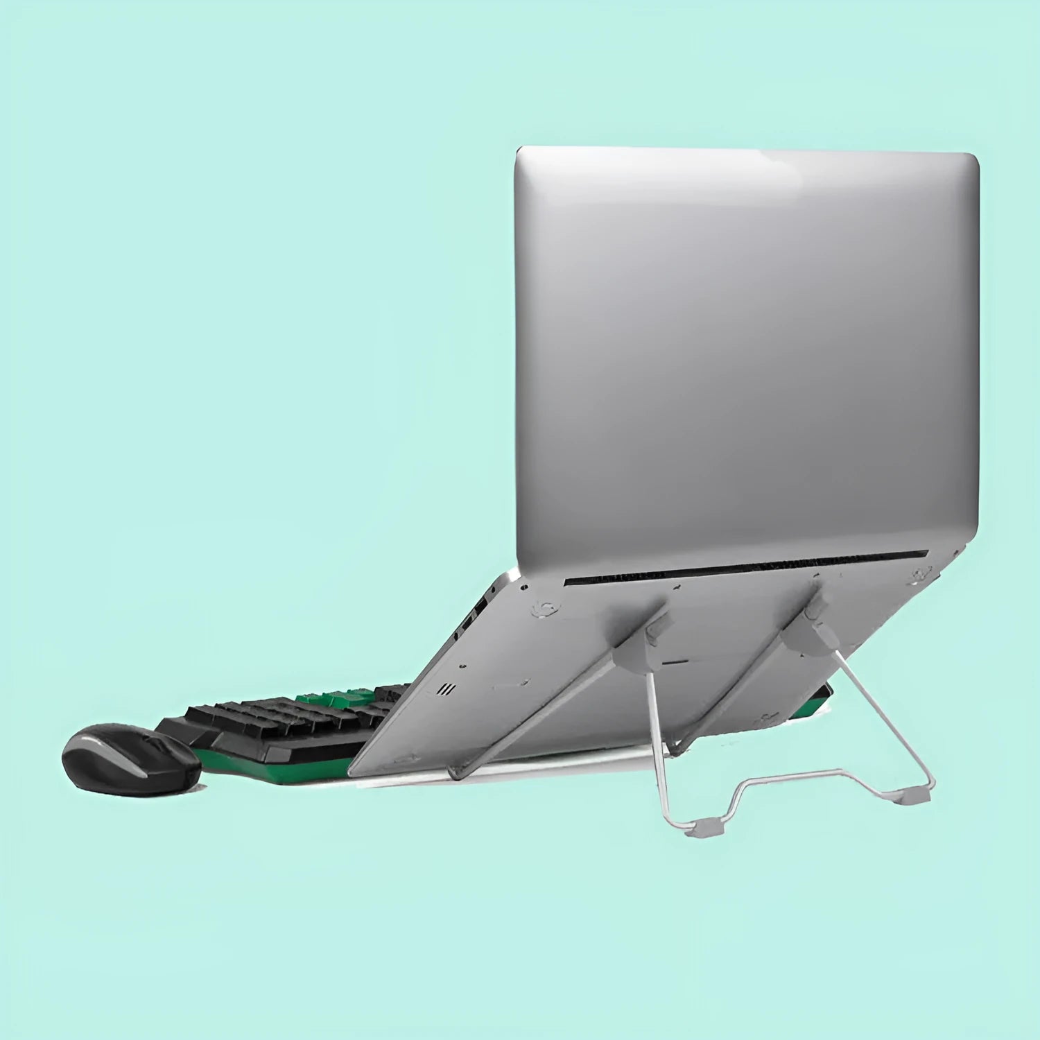 Grey aluminium alloy and plastic stand holding a mobile phone and a laptop.