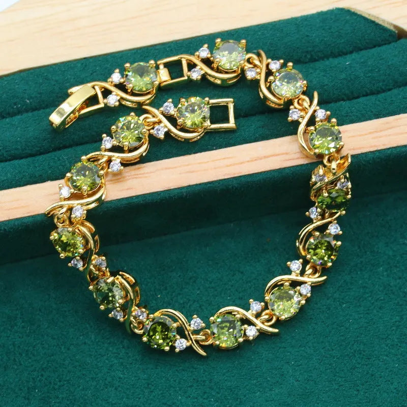 Women's rhinestone zircon jewellery set with necklace, earrings, and ring in copper electroplated finish