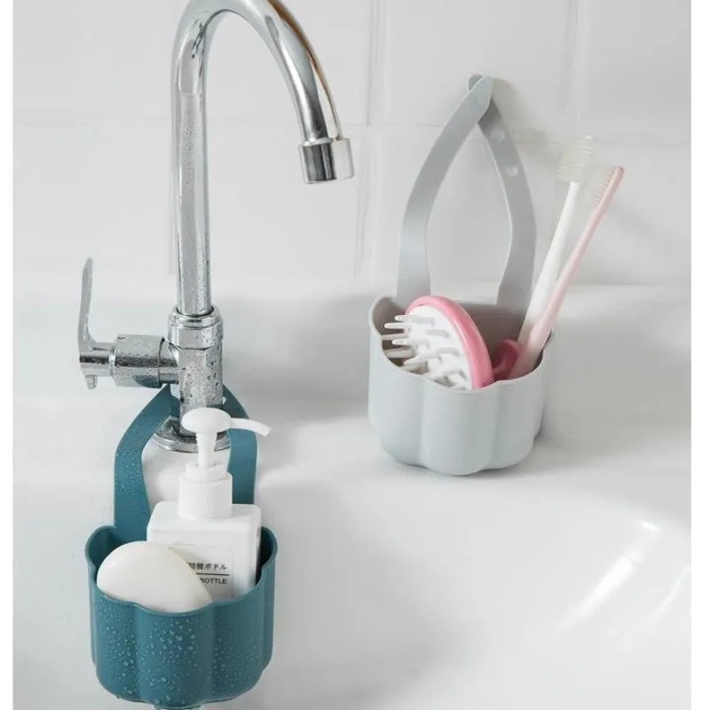 Nordic style plastic sink drain basket in dark blue on a kitchen counter