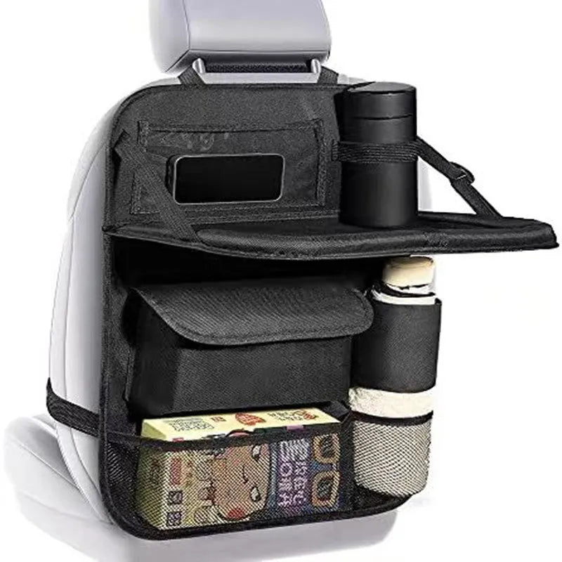 Black oxford cloth car seat back storage organiser bag hanging over a car seat.