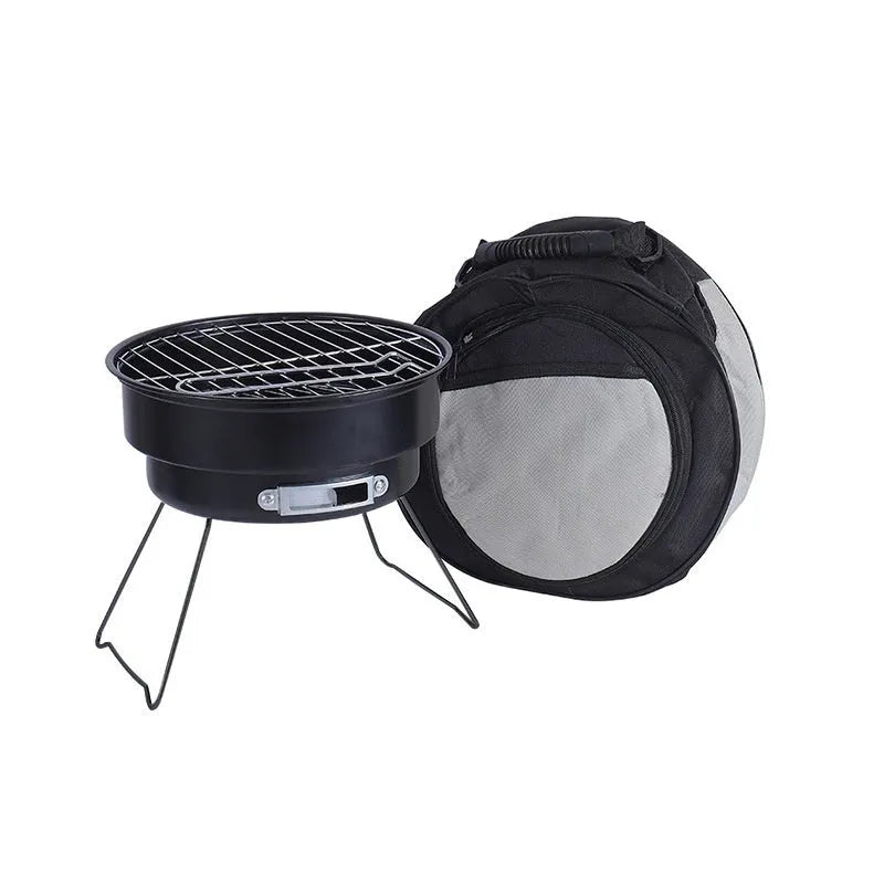 Small round folding ice stove with grill, leg, clip, and storage bag for portable outdoor cooking.