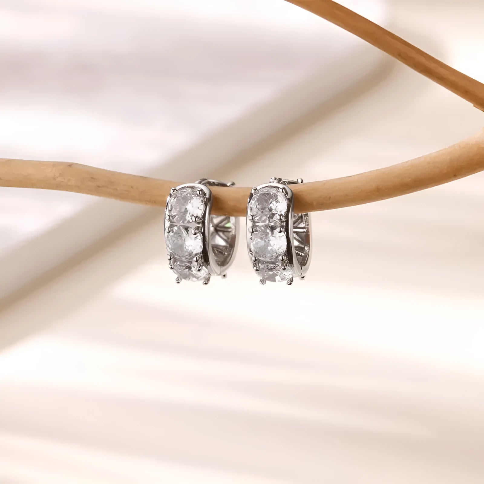 A pair of women's U-shaped clip earrings made from alloy with zircon inlay, in colour E5772P.