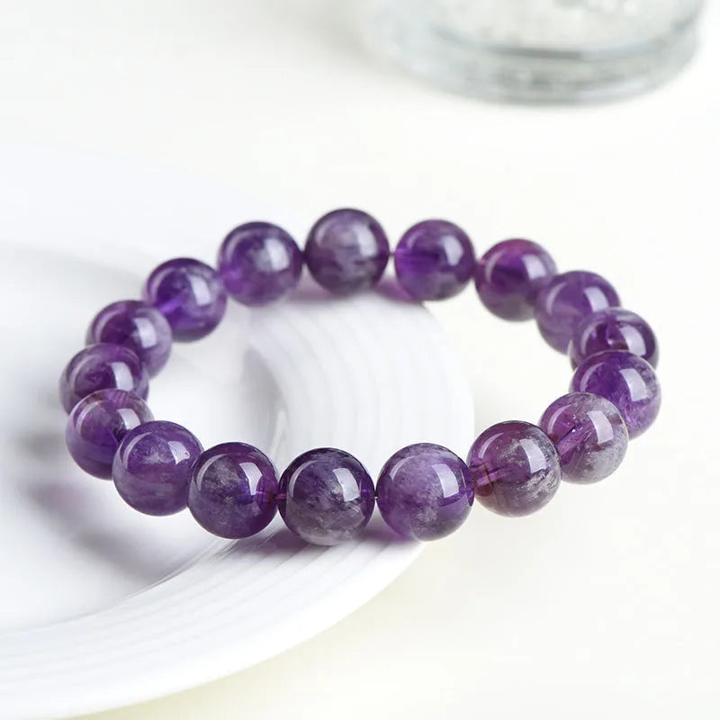 Natural Feather Amethyst bracelet with scattered beads in Snow Mountain purple colour on white background