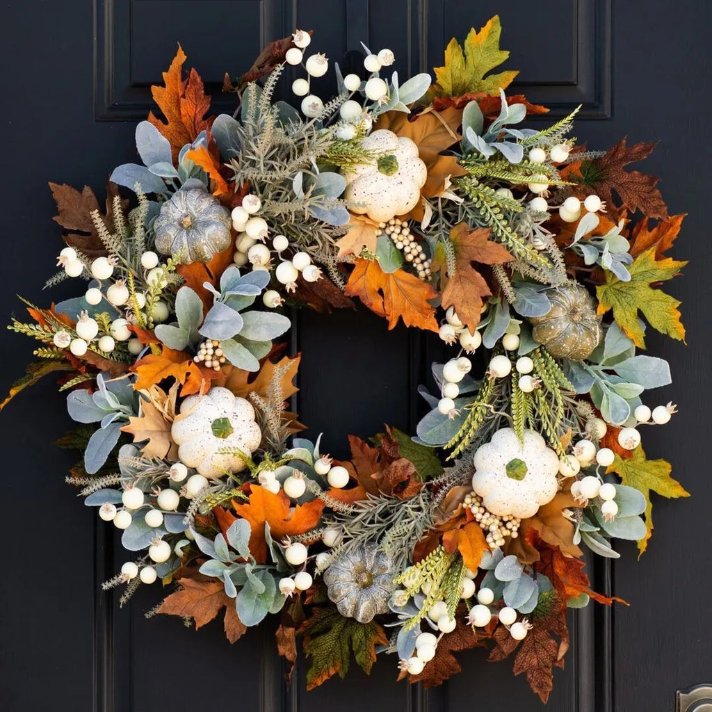 Pumpkin wreath with simulated frost leaves and pumpkins on a rattan ring base, 45x45cm size