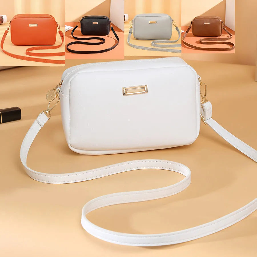 Women's solid colour PU shoulder bag with three-dimensional pocket in five colour options