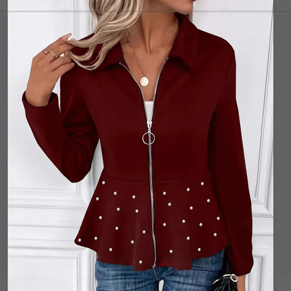 Women's black loose fit coat with heavy-duty zipper and ruffle hem, made from spandex blend fabric.