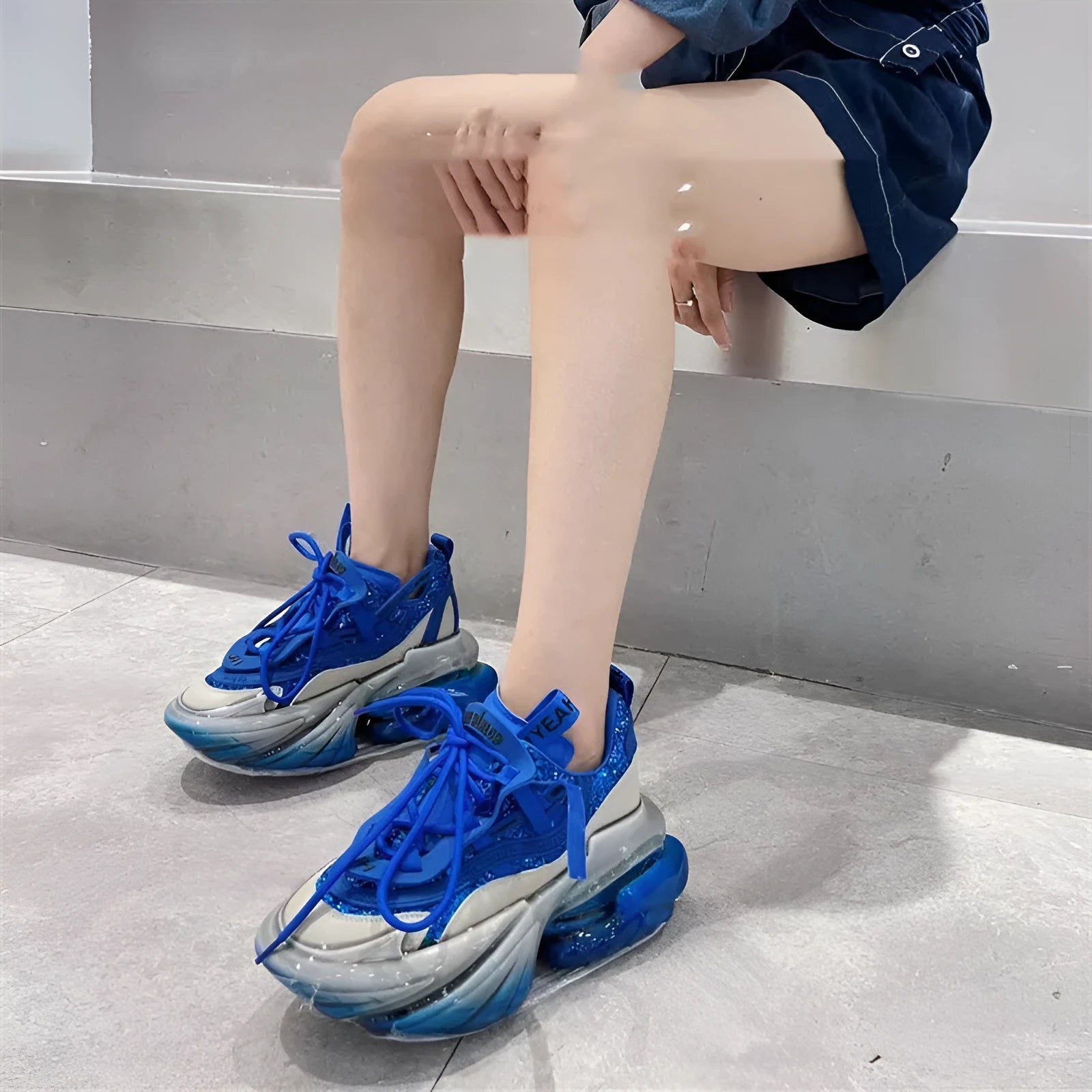 Women's high-top leather trainers with a thick translucent jelly sole and cross-tie laces