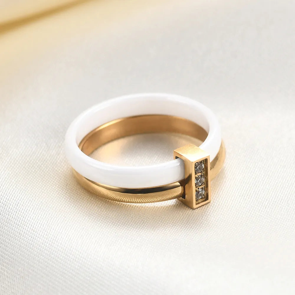 Ceramic women's ring with 6mm zirconium geometric centrepiece and glossy stitching in steel black or gold white