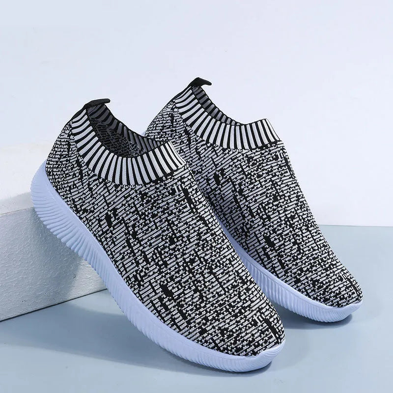Unisex stripe knit sock shoes in white with low-top design and EVA sole for running and walking