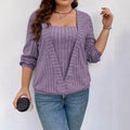 Loose fitting purple rib fabric V-neck long sleeve false two-piece suit on a hanger