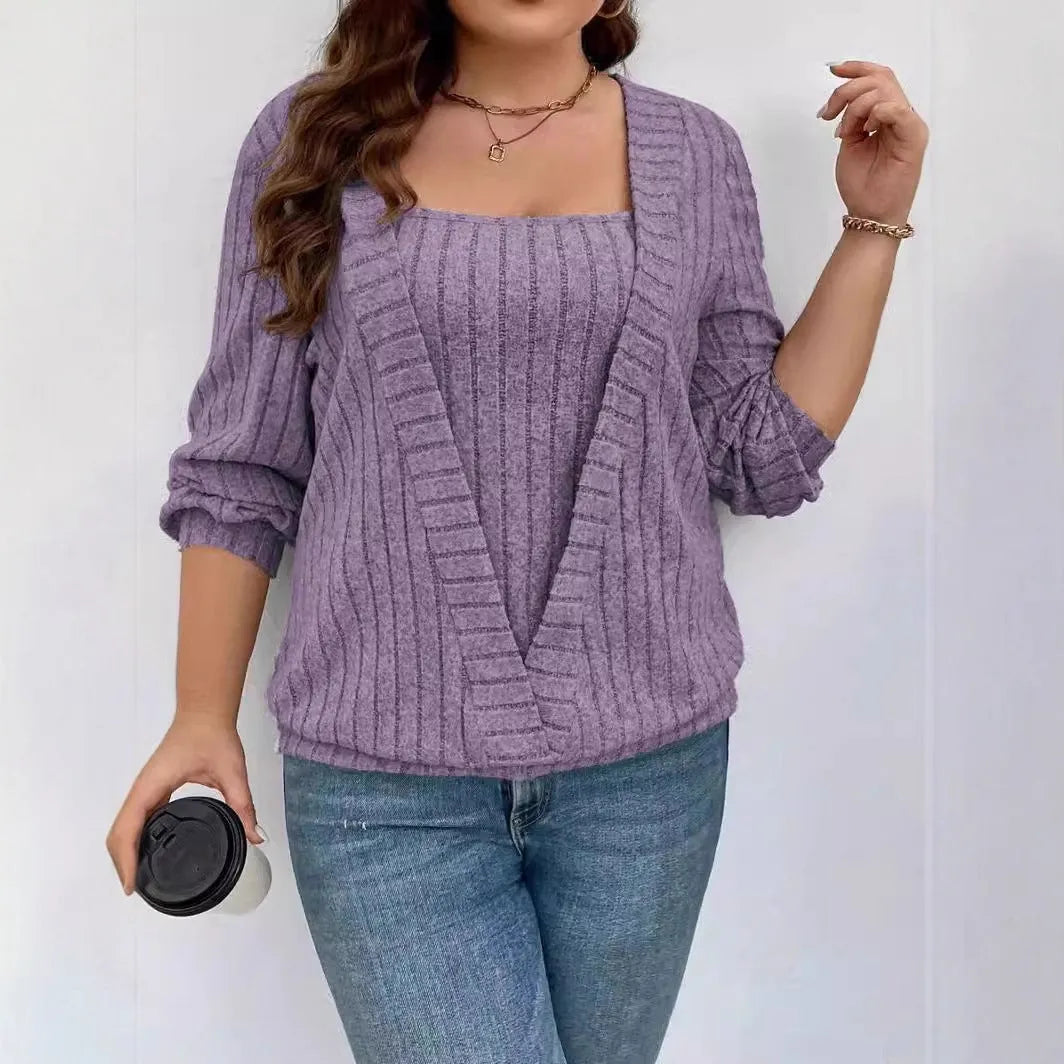 Loose fitting purple rib fabric V-neck long sleeve false two-piece suit on a hanger