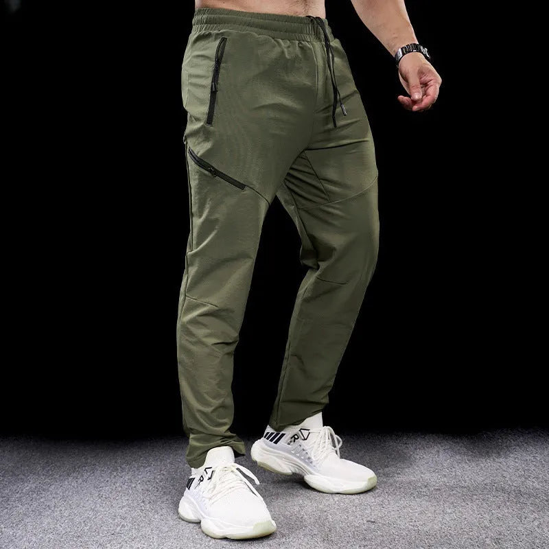Men's waterproof quick-drying nylon workout pants in multiple colours for sports and fitness
