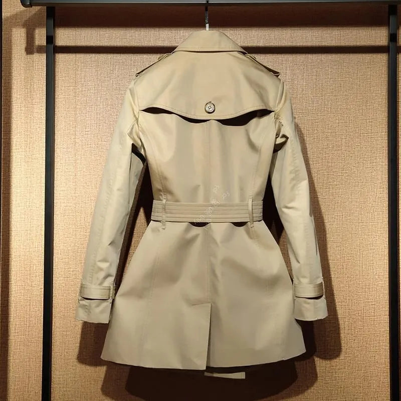 Khaki women's double-breasted polyester trench coat with flight sleeves.