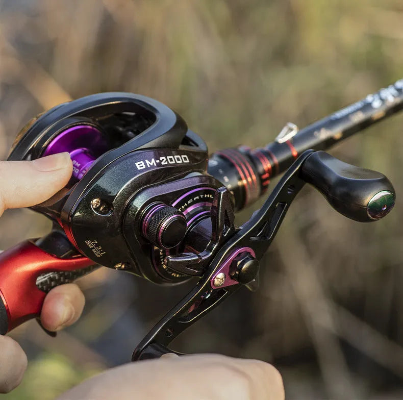 BM2000 water drop shaped spincast fishing reel with magnetic brake, shown in left and right hand versions.