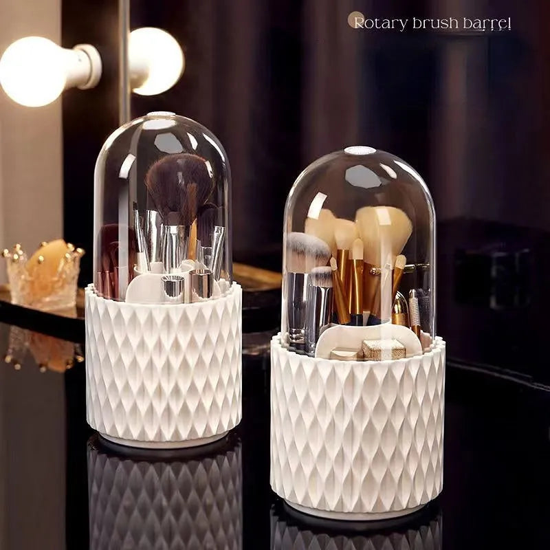 Transparent rotating makeup brush storage box with white accents and removable dust-protecting lid