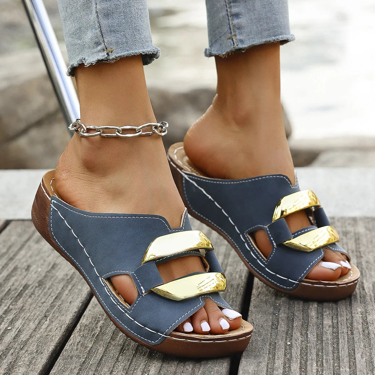 Roman style platform flip-flop sandals in a solid colour with a flat rubber sole