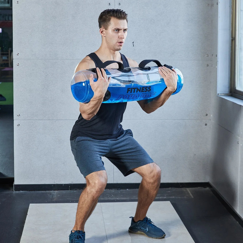 Transparent PVC inflatable weight lifting bag filled with water, showing soft dumbbell form.