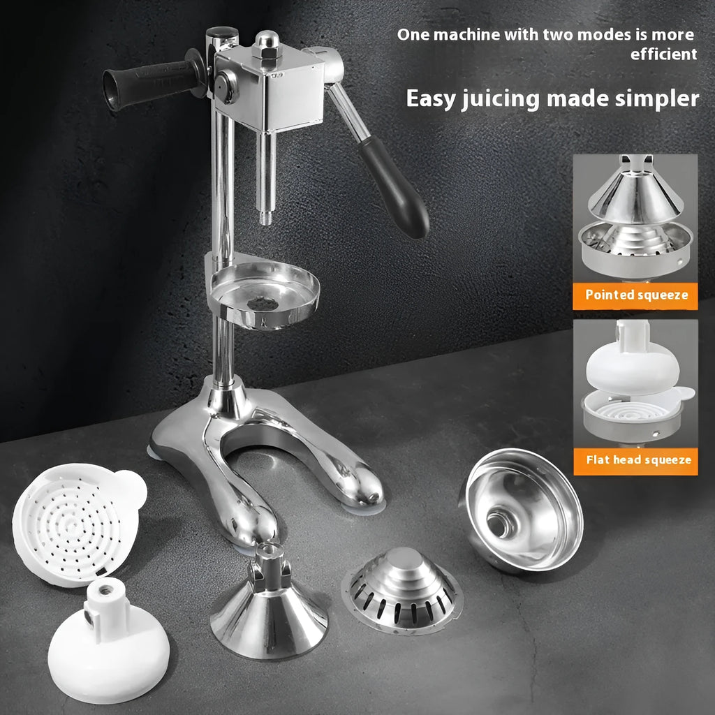 Stainless steel manual vertical juicer with zinc alloy parts and selectable head styles on a kitchen counter.
