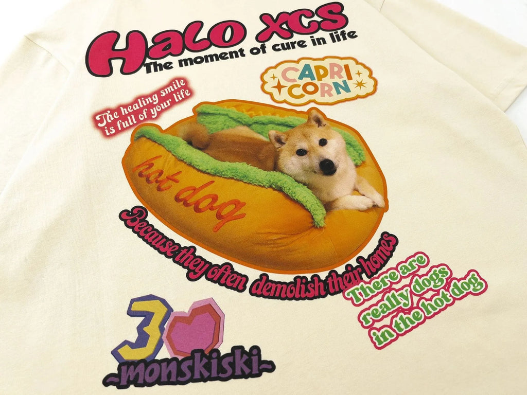 Cartoon hamburger dog printed cotton t-shirt in loose fit showing white, apricot and sky blue colour options