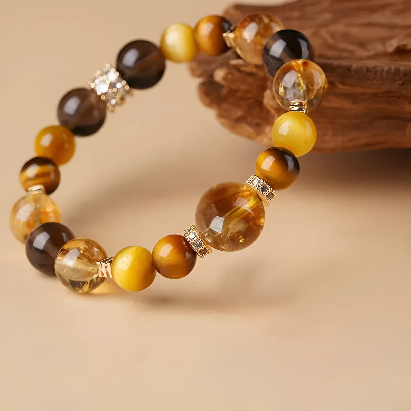 Geometric yellow crystal tiger-eye bracelet showing 10mm and 12mm size options