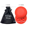 Orange natural rubber golf training mat with centre of gravity trainer for swing practice