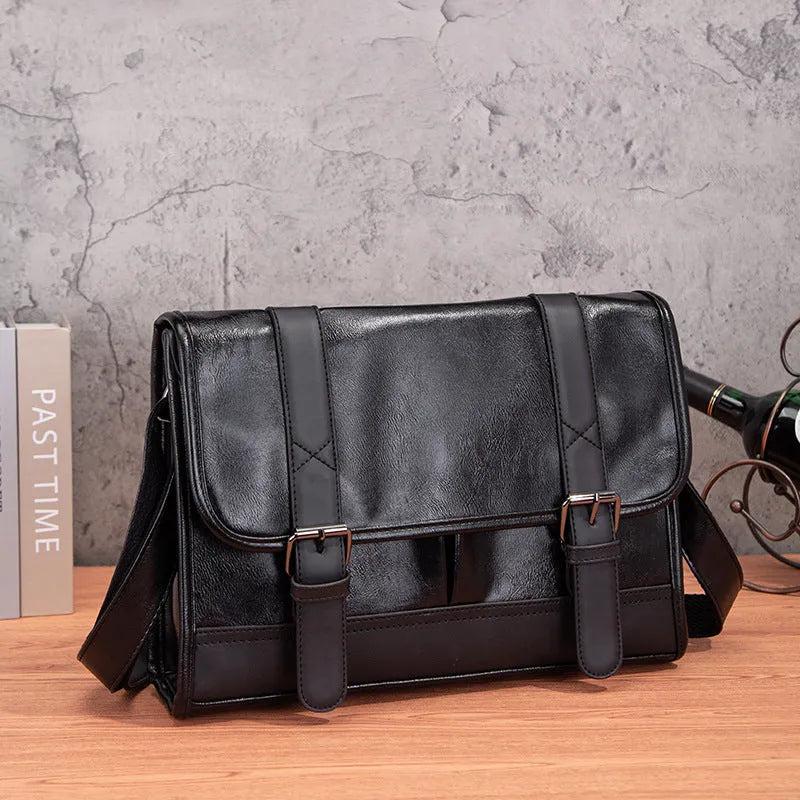 Black Korean-style men's anti-theft commuter backpack with waterproof PU material and visible sewing thread detailing